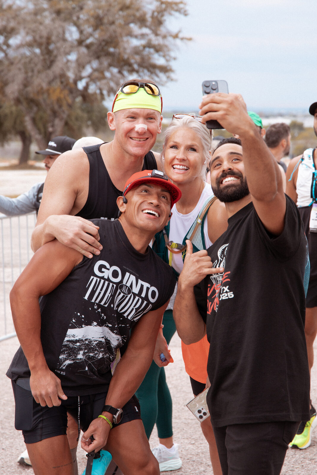 Runners taking a selfie at the finish